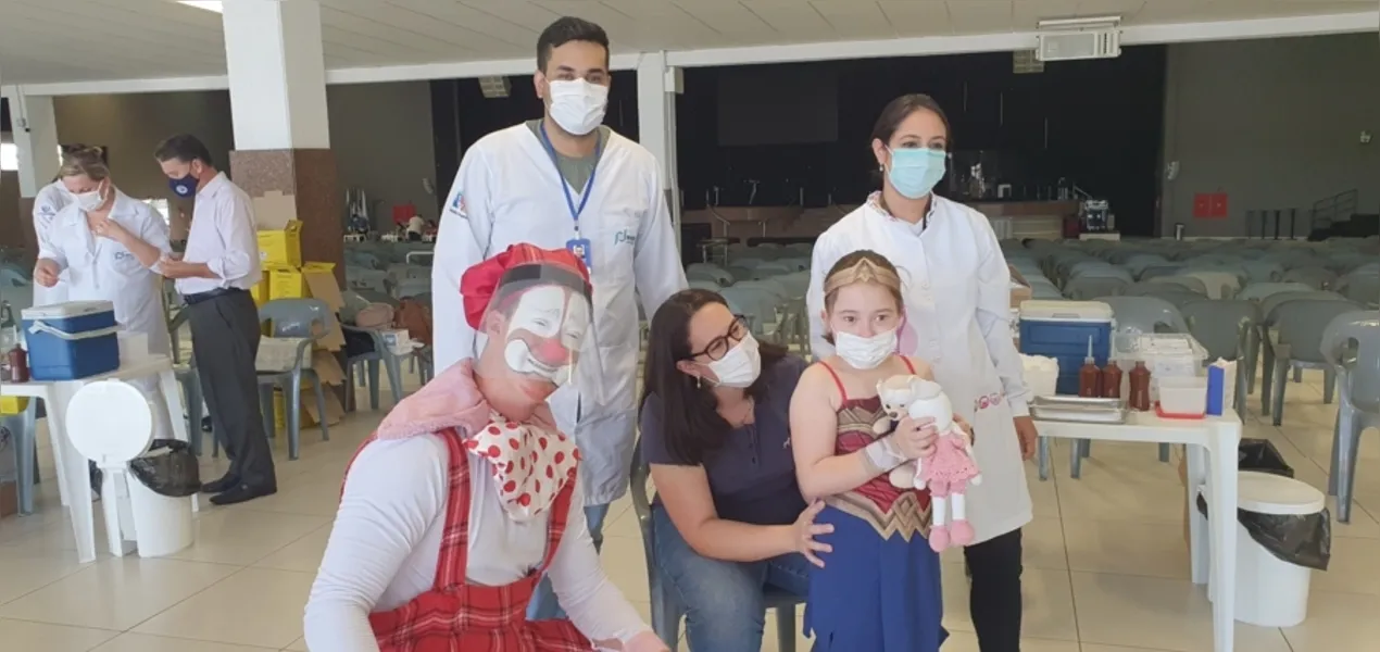 Com cardiopatia congênita, Júlia  é a primeira criança vacinada em PG