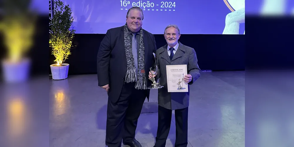 Imagem ilustrativa da imagem Proprietário do Foto Carlos, recebe o Troféu Guerreiro do Comércio